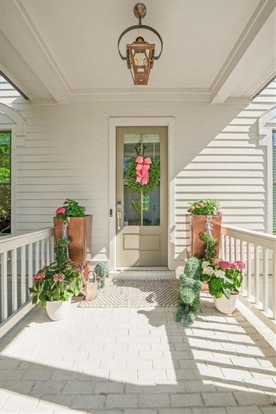 Exterior details and patio area of a home in Manning on the Square, Alpharetta (Image 26).