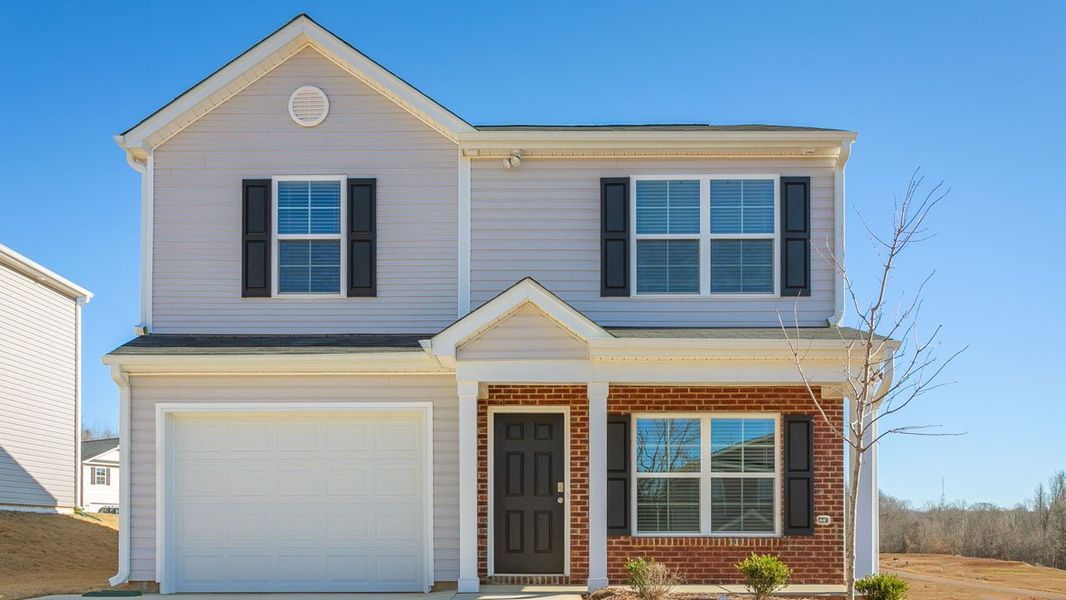 Front exterior of a new home in Hobbs Farm, Ayden, NC, highlighting curb appeal (Image 19).