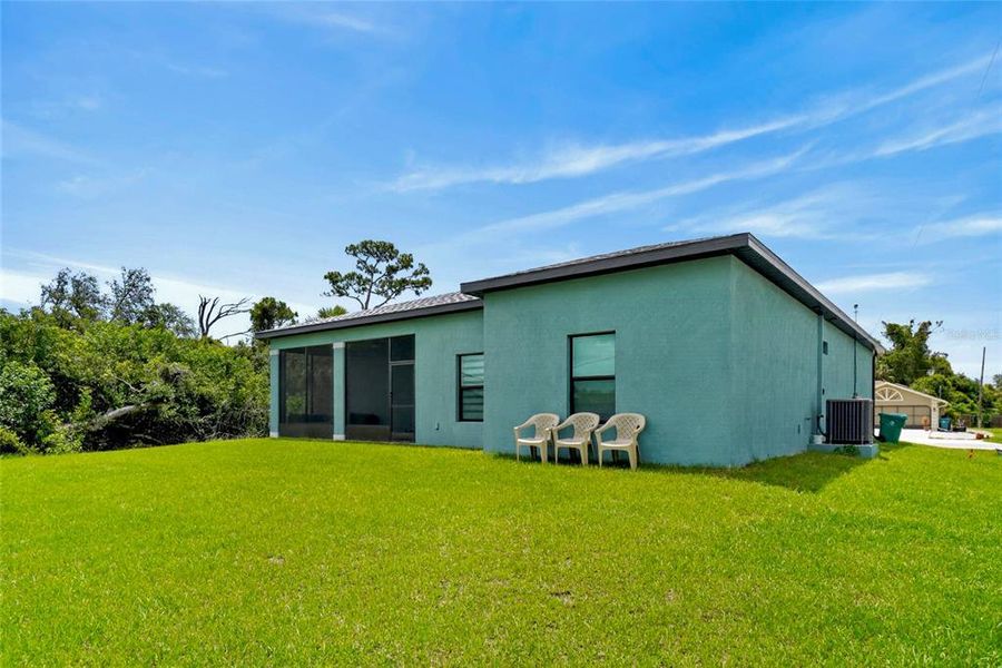 Exterior details and patio area of a home in , Port Charlotte (Image 33).
