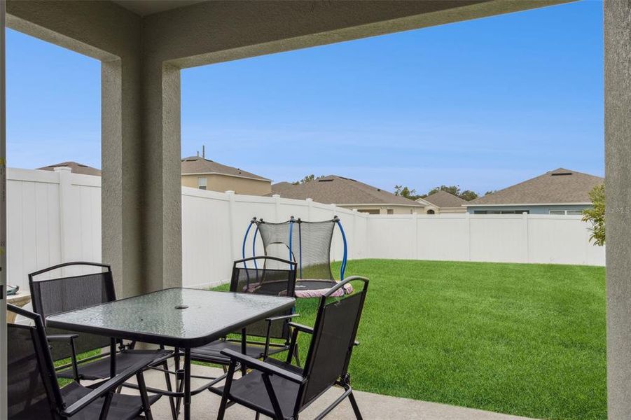 Exterior details and patio area of a home in Wind Meadows South, Bartow (Image 3).