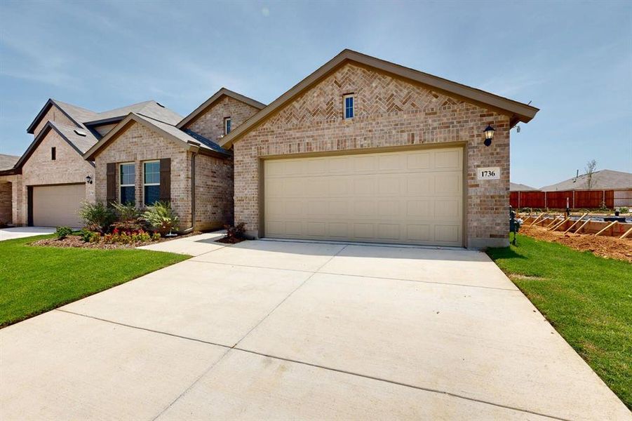 Front exterior of a new home in Sanderos, Fort Worth, TX, highlighting curb appeal (Image 24). Front exterior of a new home in Sanderos, Fort Worth, TX, highlighting curb appeal (Image 24).