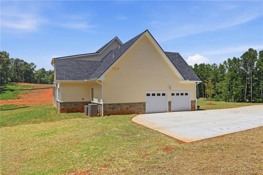 Front exterior of a new home in , Cornelia, GA, highlighting curb appeal (Image 2).