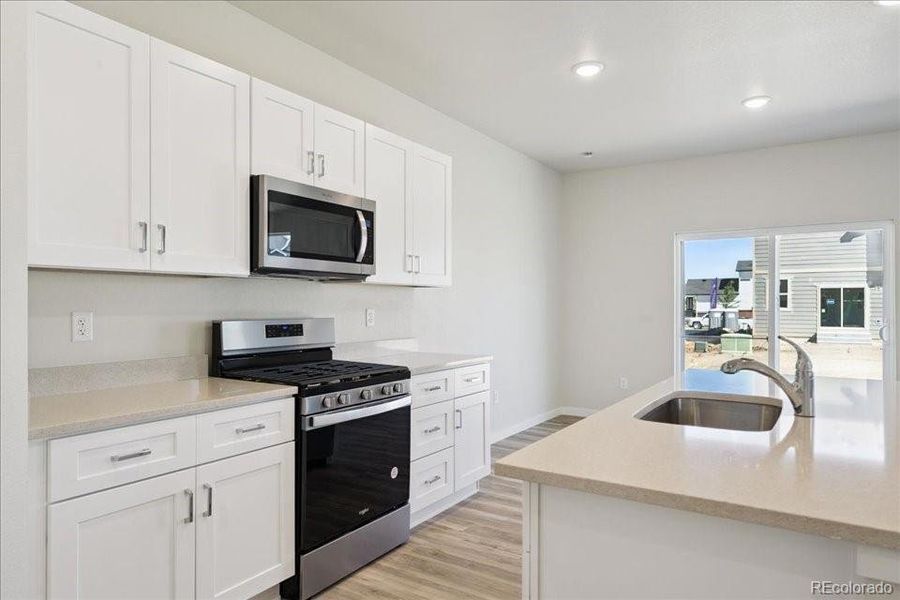 Furnished interior view inside a new home in Coyote Creek, Fort Lupton (Image 6).