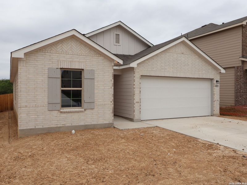 Front exterior of a new home in Agave, San Antonio, TX, highlighting curb appeal (Image 1). Front exterior of a new home in Agave, San Antonio, TX, highlighting curb appeal (Image 1).
