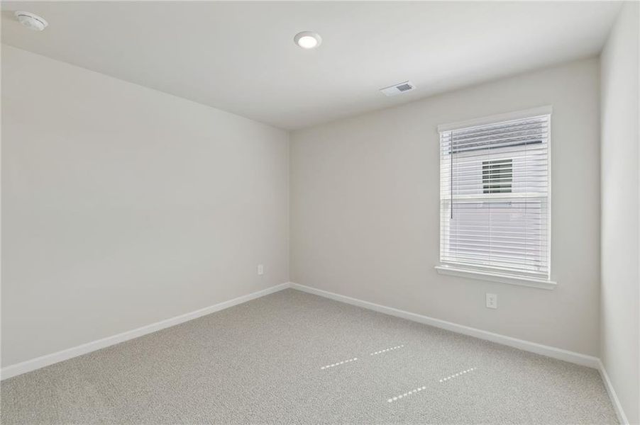 Spacious, unfurnished interior of a new home in Hemingway - Reserve Series, Cumming (Image 40).