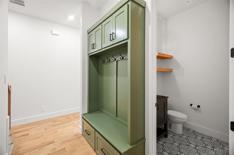 Mudroom with light wood-type flooring