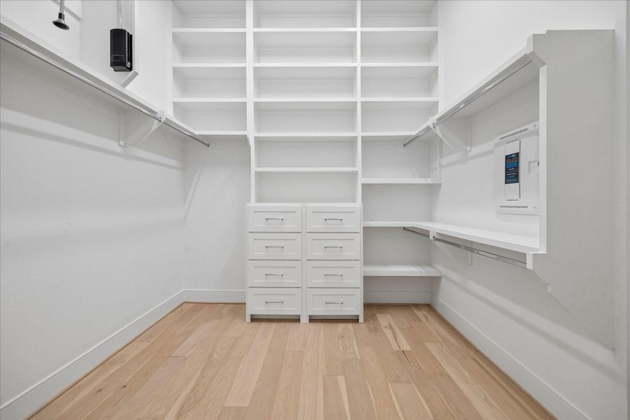 The primary closet has been upgraded with built in cabinets and shelves. The primary closet has been upgraded with built in cabinets and shelves.
