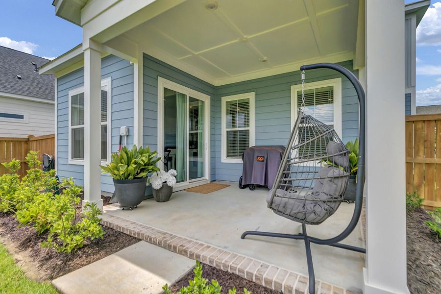 Exterior details and patio area of a home in Midtown at Nexton, Summerville (Image 26).