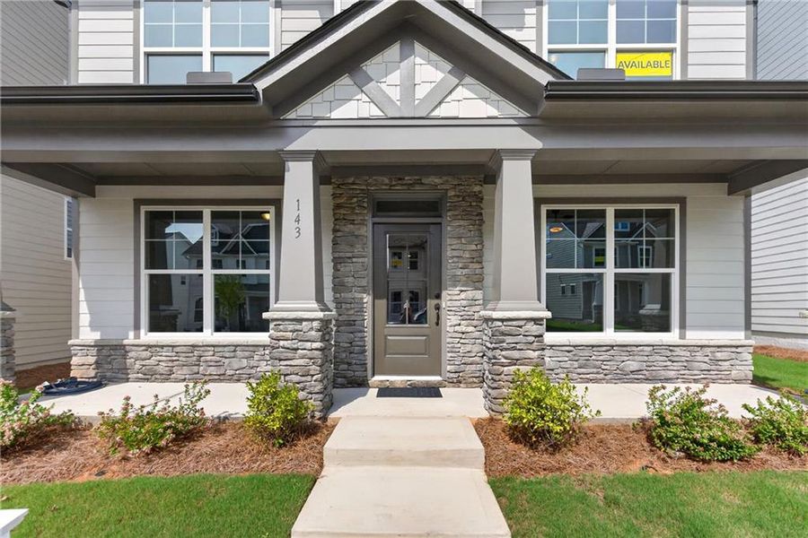 Exterior details and patio area of a home in Marble Tree, Ball Ground (Image 3).
