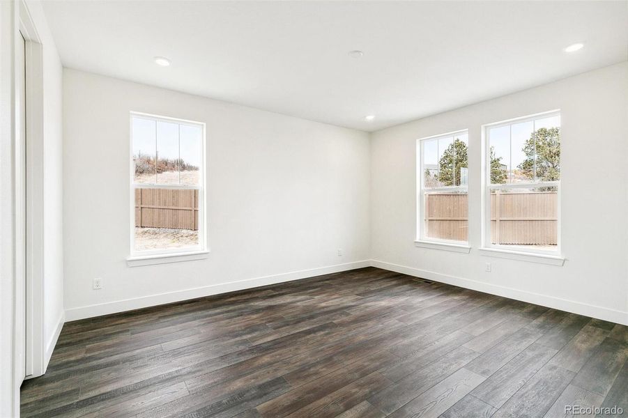 Spacious, unfurnished interior of a new home in Terrain Oak Valley, Castle Rock (Image 28).