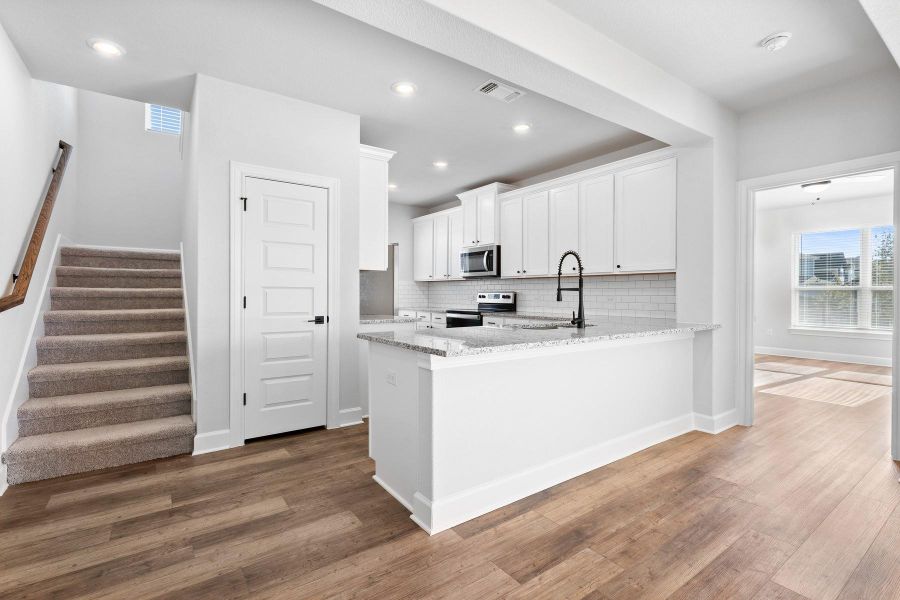 Furnished interior view inside a new home in Whisper Valley, Manor (Image 3).