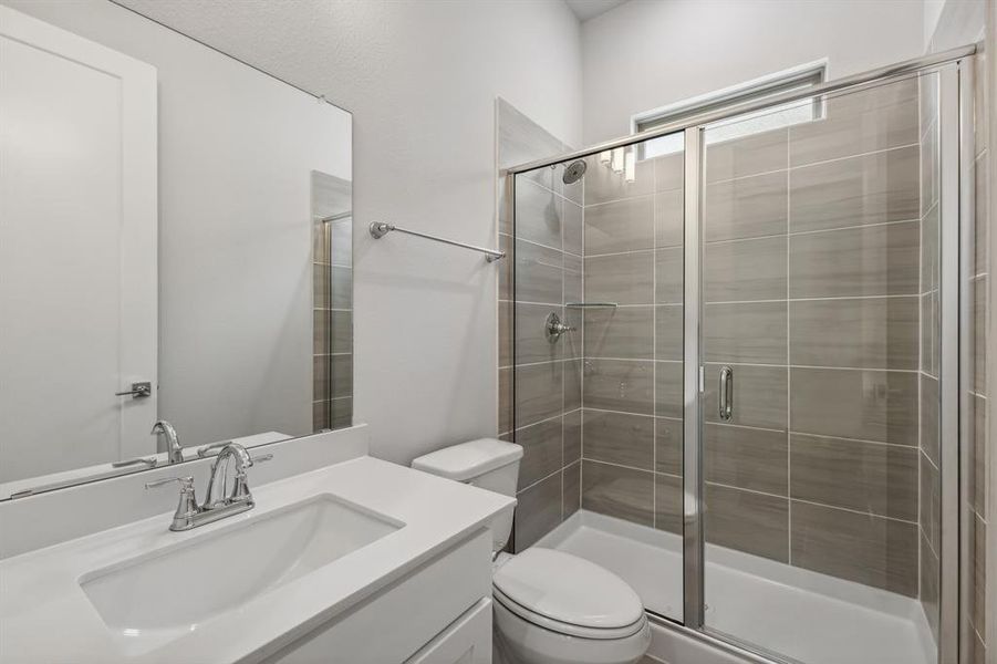 Bathroom in the Matisse home plan by Trophy Signature Homes – REPRESENTATIVE PHOTO