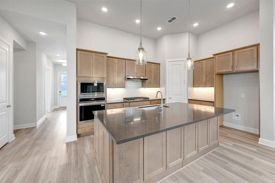 Furnished interior view inside a new home in Sienna - Landmark Row Collection, Missouri City (Image 5).