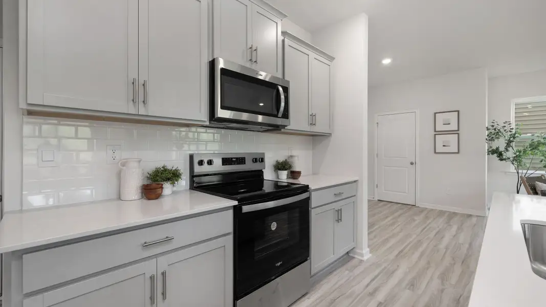 Furnished interior view inside a new home in Sweetwater Village, Rockwell (Image 3).