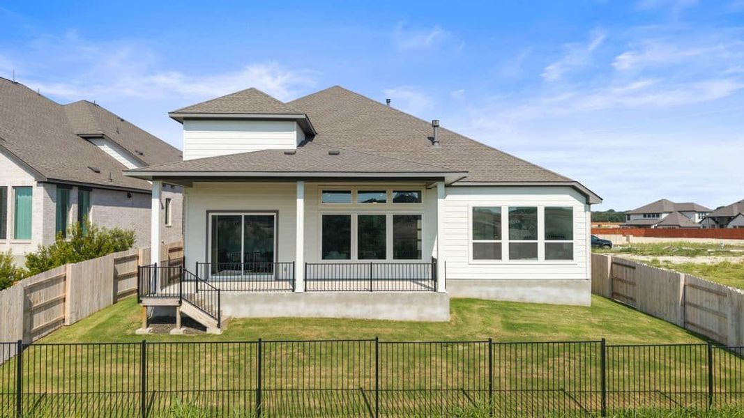 Exterior details and patio area of a home in Lariat, Liberty Hill (Image 35).