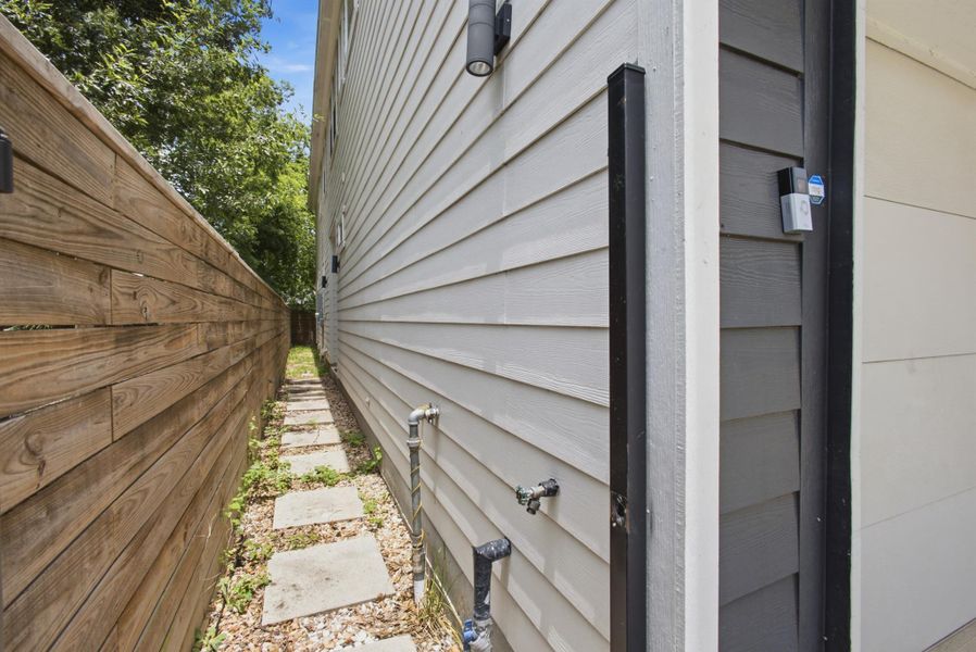 Exterior details and patio area of a home in , Houston (Image 28). Exterior details and patio area of a home in , Houston (Image 28).