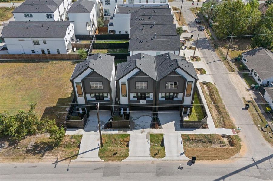 View of the three standing homes from Live Oak Collection.