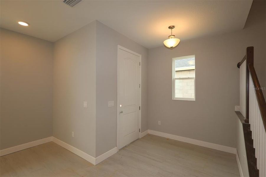 Spacious, unfurnished interior of a new home in Lake Star at Ovation, Winter Garden (Image 14).