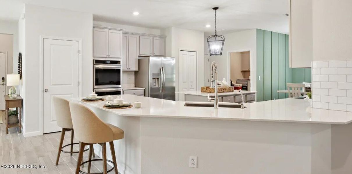 Furnished interior view inside a new home in Silver Falls Single Family at SilverLeaf, St. Augustine (Image 4).