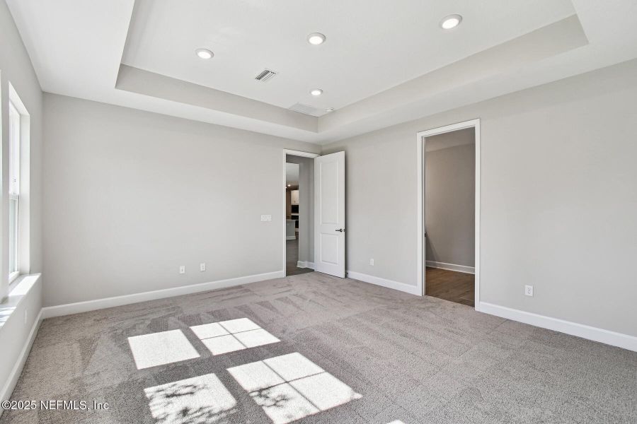 Spacious, unfurnished interior of a new home in Tributary 70', Yulee (Image 19).