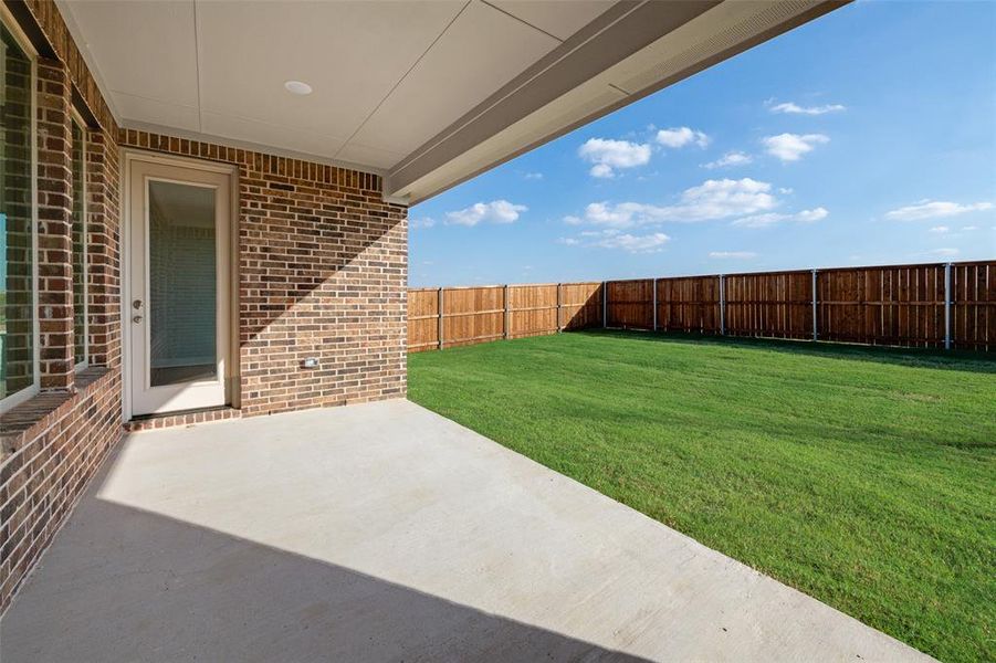Exterior details and patio area of a home in Arbors at Legacy Hills, Celina (Image 4).