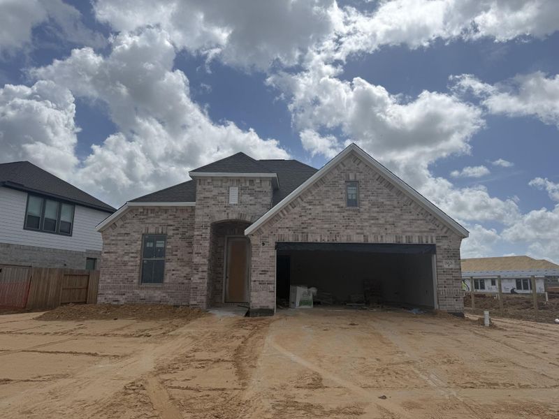 In-progress construction of a new home in Valencia, Manvel, TX (Image 11).