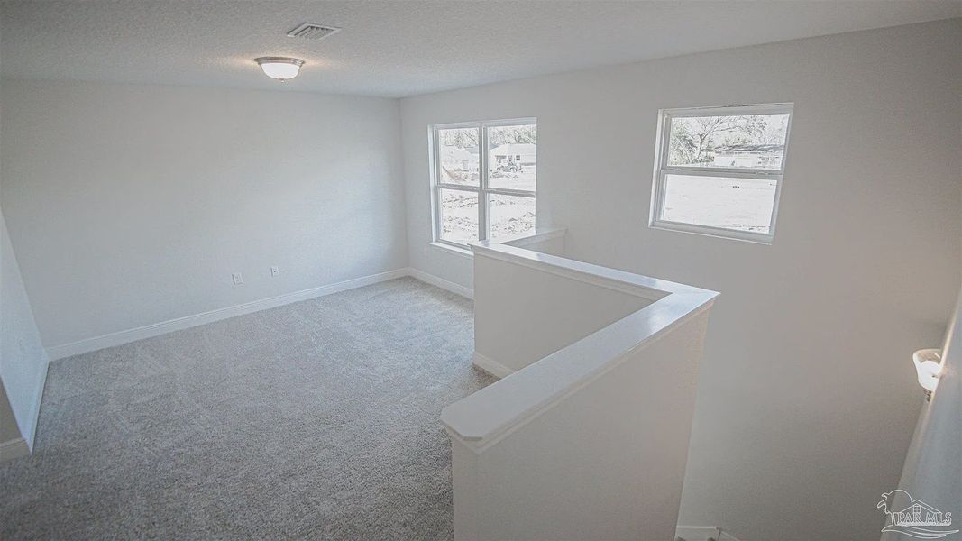 Spacious, unfurnished interior of a new home in Pine Top, Cantonment (Image 10).