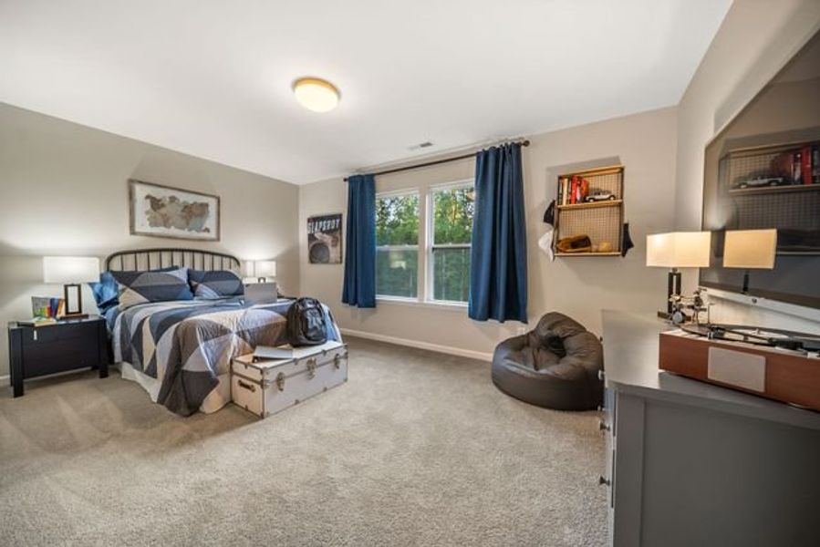 Representative furnished interior of a home built from the Kipling by True Homes in Whispering Hills, Locust (Image 15).