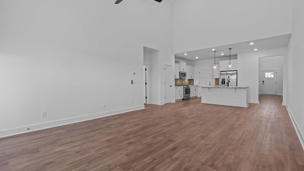 Two-story ceilings and superior scale define this elegant, light-filled family room