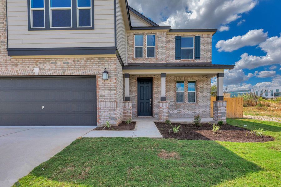 Exterior details and patio area of a home in Mustang Valley, Manor (Image 23).