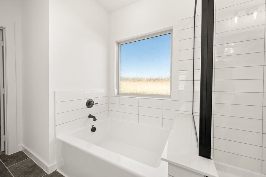 Furnished interior view inside a new home in Country Hollow Sales Phase 1, Willow Park (Image 12).