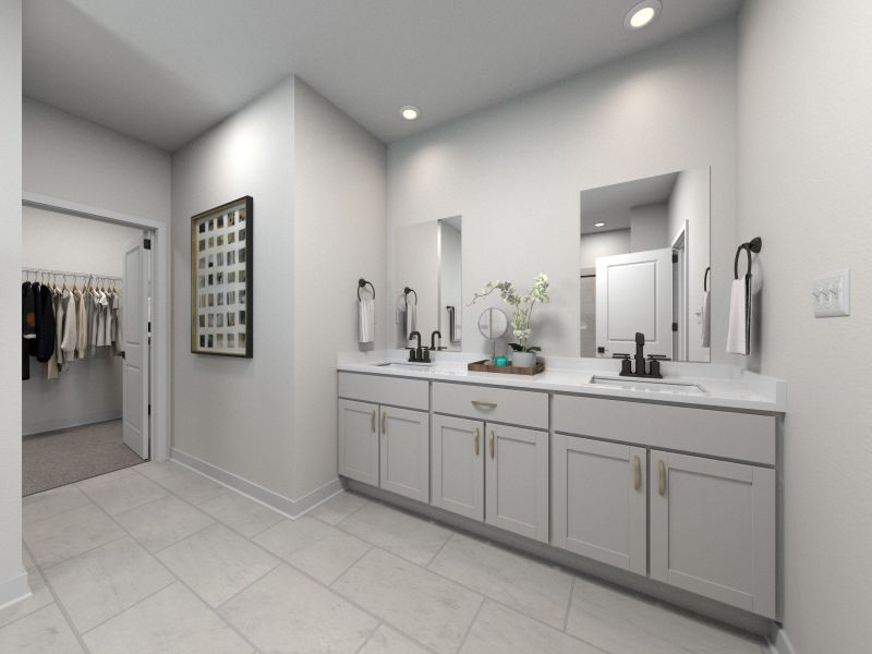 The primary bathroom offers dual vanity sinks and a walk-in shower. The primary bathroom offers dual vanity sinks and a walk-in shower.