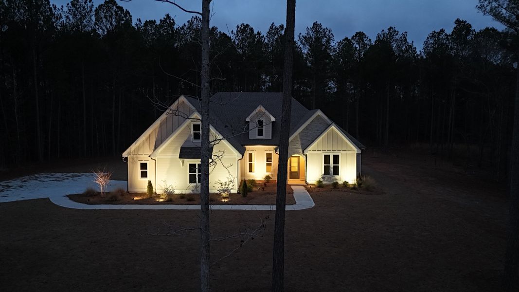 Front exterior of a new home in Flint Farms, Concord, GA, highlighting curb appeal (Image 34).