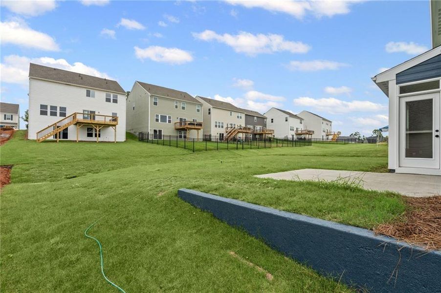 Front exterior of a new home in Twin Lakes, Hoschton, GA, highlighting curb appeal (Image 21).