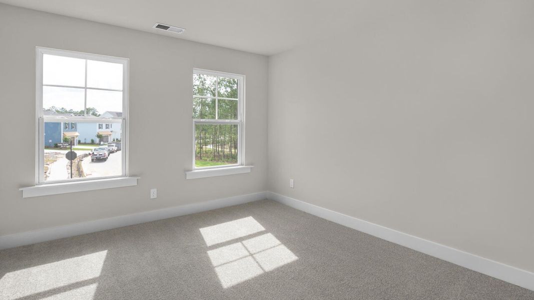 Spacious, unfurnished interior of a new home in Indigo Preserve, Leland (Image 32).