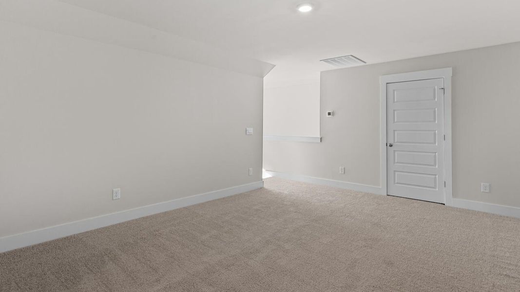 Spacious, unfurnished interior of a new home in Indigo Preserve, Leland (Image 33).