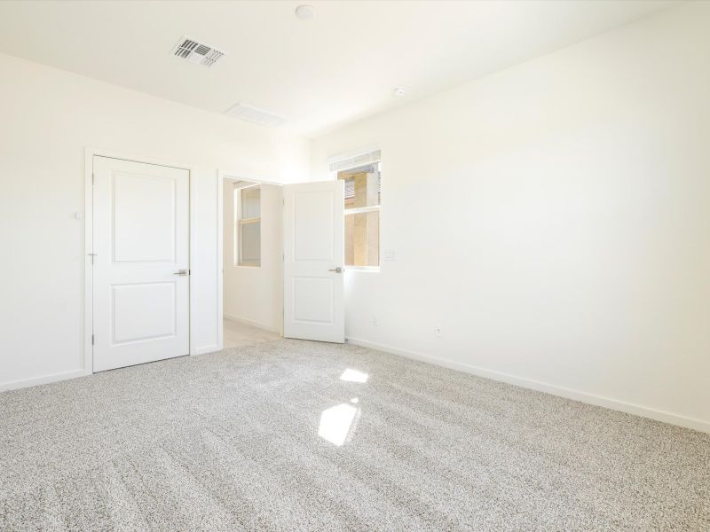 Spacious, unfurnished interior of a new home in The Preserve at Province II 55+/Active Adult, Maricopa (Image 12).