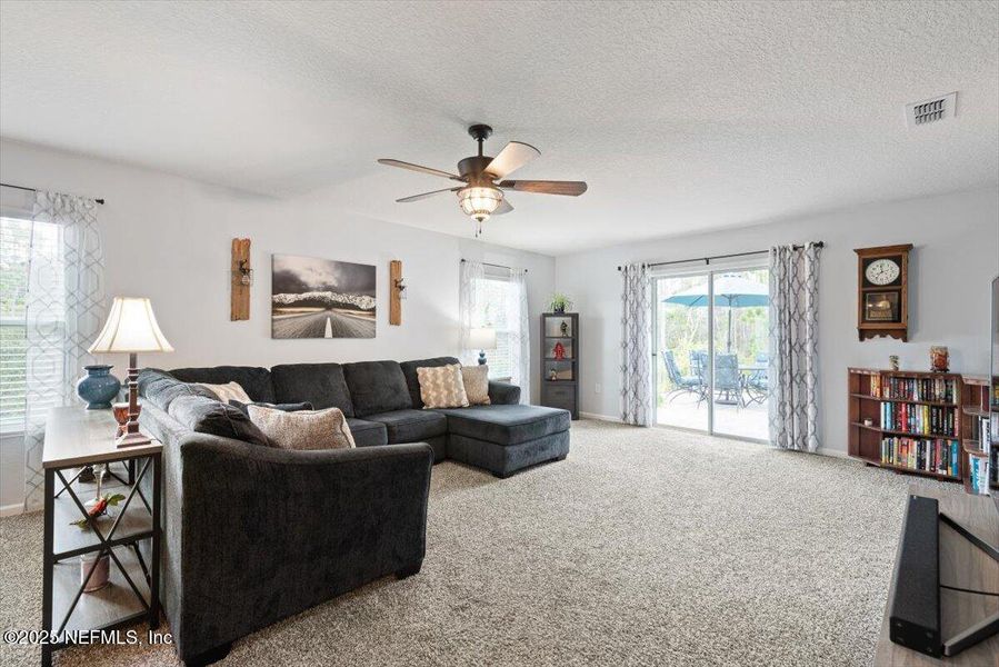 Furnished interior view inside a new home in River Glen Express, Yulee (Image 7).