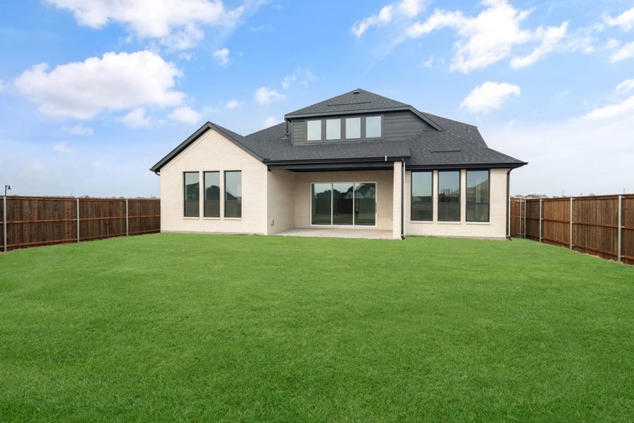 Exterior details and patio area of a home in Cambridge Crossing, Celina (Image 22).