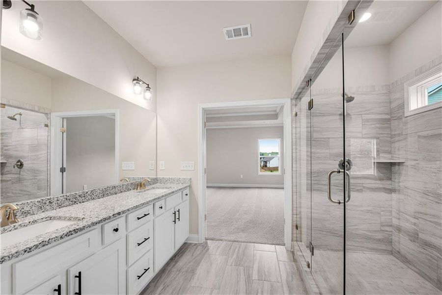 Furnished interior view inside a new home in Hidden Fields, Hoschton (Image 18).
