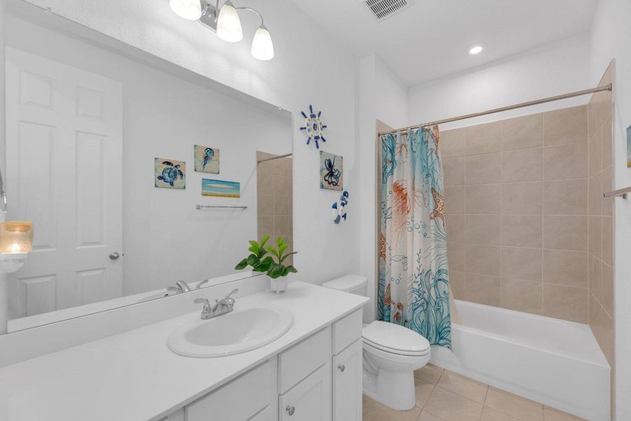 Furnished interior view inside a new home in Seasons at Carillon, Manor (Image 8).