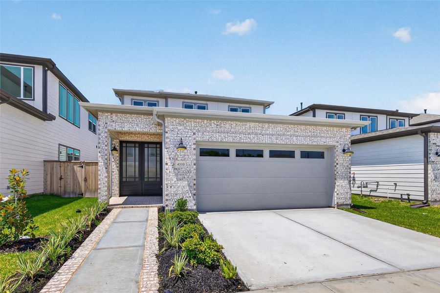 Front exterior of a new home in , Stafford, TX, highlighting curb appeal (Image 28). Front exterior of a new home in , Stafford, TX, highlighting curb appeal (Image 28).