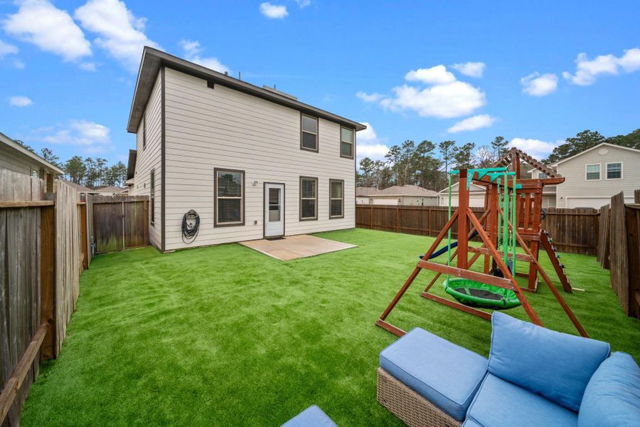 Front exterior of a new home in , Porter, TX, highlighting curb appeal (Image 21). Front exterior of a new home in , Porter, TX, highlighting curb appeal (Image 21).