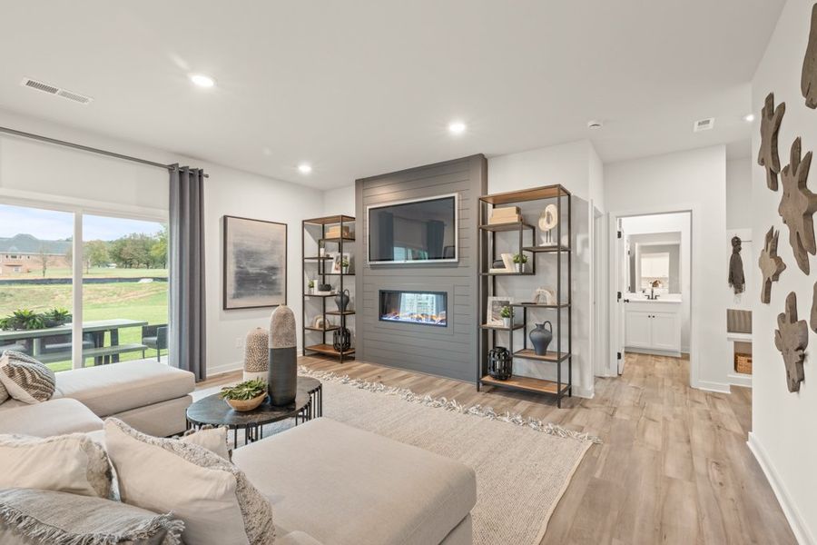 A living room with a large window.