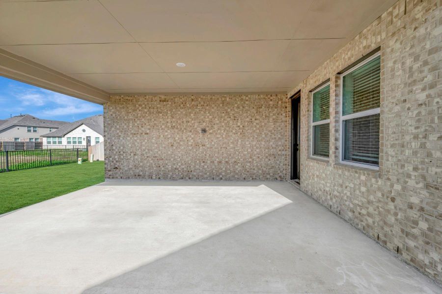Relax outdoors on the covered patio Relax outdoors on the covered patio