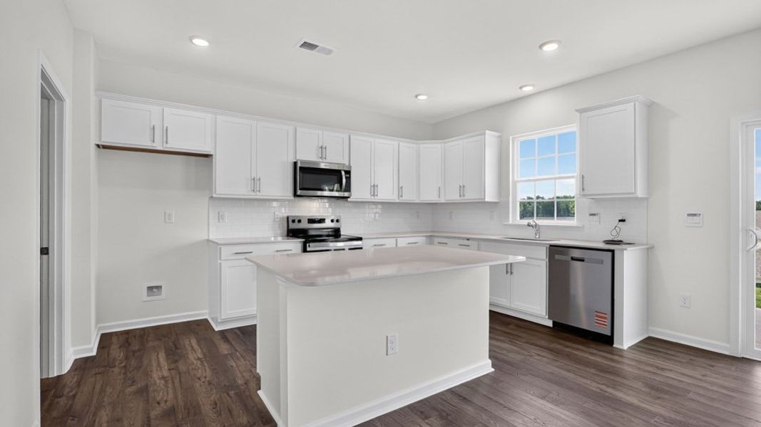 Furnished interior view inside a new home in The Reserve at Prestleigh, Wake Forest (Image 4).