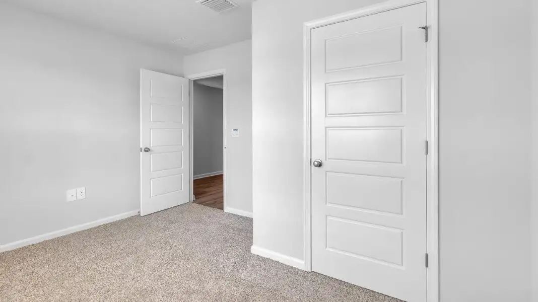 Spacious, unfurnished interior of a new home in Saunders Village, Northwest (Image 13). Spacious, unfurnished interior of a new home in Saunders Village, Northwest (Image 13).