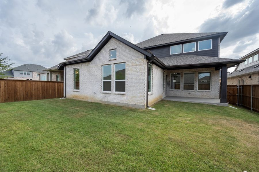 Exterior details and patio area of a home in Creekview Meadows, Pilot Point (Image 2). Exterior details and patio area of a home in Creekview Meadows, Pilot Point (Image 2).