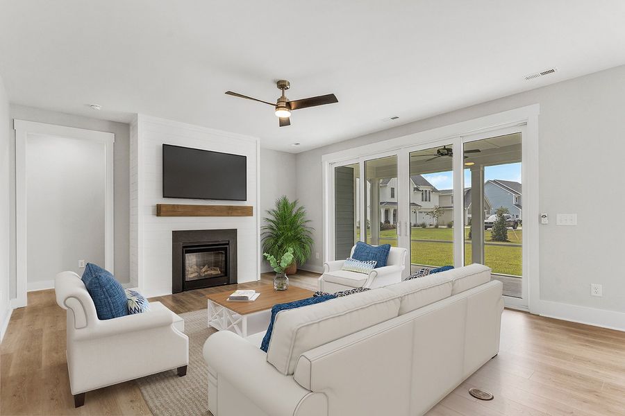 Representative furnished interior of a home built from the The Chandler by RobuckHomes in Windwater, Hampstead (Image 13).