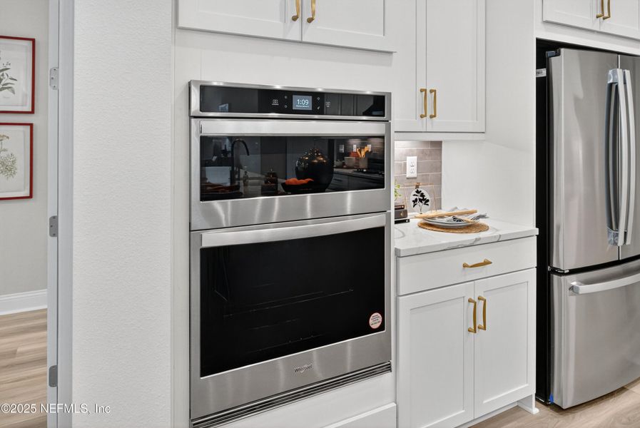 Furnished interior view inside a new home in RiverTown - WaterSong, St. Johns (Image 35).